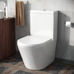 Modern Rimless Close Coupled Toilet Ceramic With Soft Closing Seat White Magus